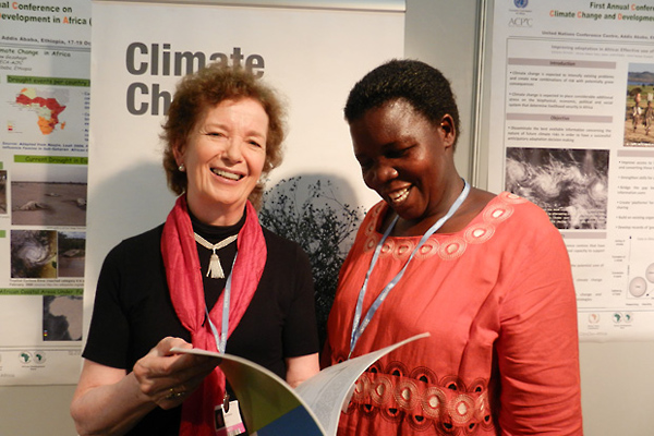 Mary Robinson with Constance Okollet