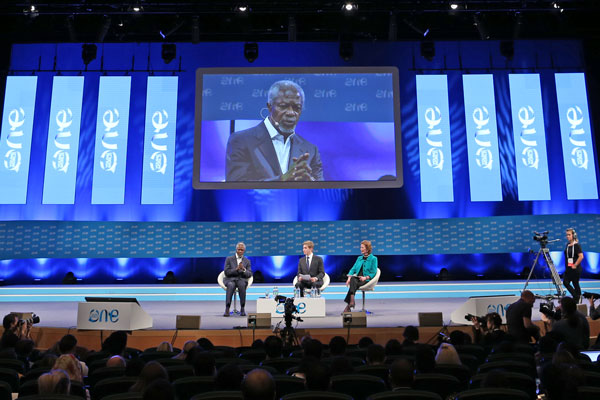 Mary Robinson and Kofi Annan on stage at One Young World with Parker Liautaud