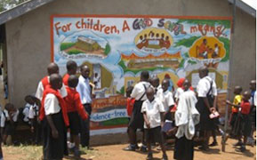 Murals painted by Joy for Children in a rural Ugandan community