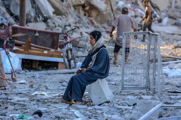 Palestinians return to their destroyed homes after an Israeli military operation east of Deir Al -Balah, in the central Gaza Strip, on August 29, 2024.
